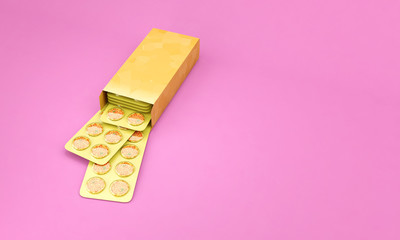 Unhealthy pizza in a drug blister packaging and open box. Diet food concept medicines pharmaceutical idea.