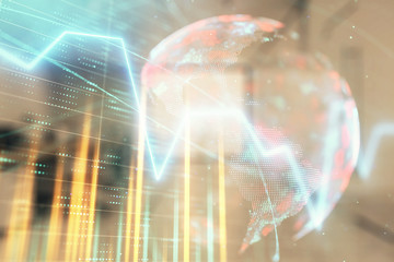 Stock and bond market graph and world map with trading desk bank office interior on background. Multi exposure. Concept of international finance