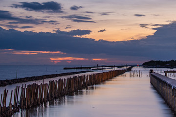 Beautiful of The walkway bridge in evening at Bang Khun Thian sea view, Bang Khun Thian, Bangkok.