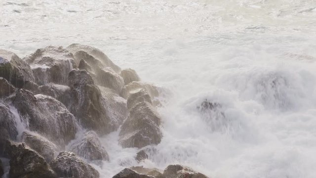 Wave hitting a waterblock in Italy - Riomaggiore
