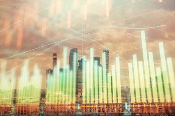 Double exposure of financial graph on downtown veiw background. Concept of stock market research and analysis