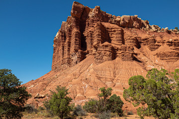 A close up of an impressive-looking rock formation, various shades of red, rugged and barren Canyonlands National Park, Utah