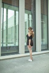 Fototapeta premium Girl doing things on street