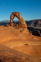 A portrait shot of the beautiful Delicate Arch at dusk at Arches National Park