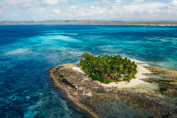 Fototapeta na wymiar Guyam island view from the sky. shot taken with drone above the beautiful island. concept about travel, nature, and marine landscapes