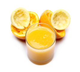 Organic mix juice in glass with peel lemon and orange isolated on white, top view