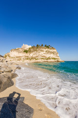 Former 4th century monastery on top of the Sanctuary of Santa Maria Island - Tropea, Calabria, Italy. Tropea Beach at Tyrrhenian Sea.