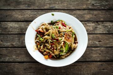 pasta with pesto sauce and basil