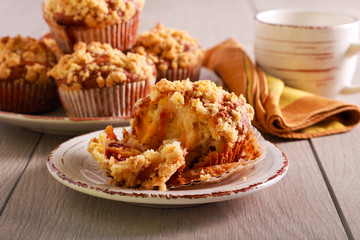 Fruit muffins with crumble topping, served