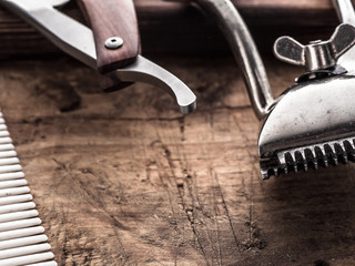 barber tools. vintage clipper straight razor. hairbrush.