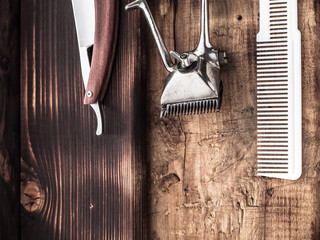 barber tools. vintage clipper straight razor. hairbrush.