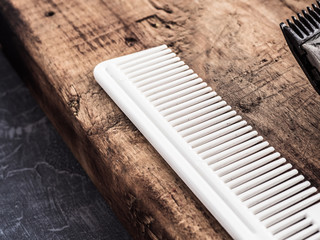 barber tools. vintage clipper straight razor. hairbrush.