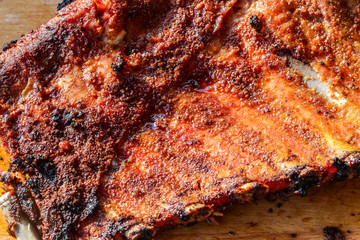 Obraz na płótnie Canvas Macro photo of grilled pork ribs.