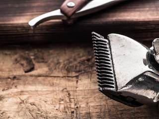 barber tools. vintage clipper straight razor. hairbrush.