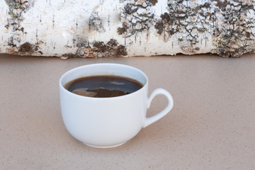 black coffee on birch wood