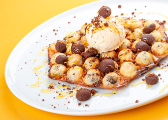 Bubble waffles with ice cream and chocolate chip cookies.