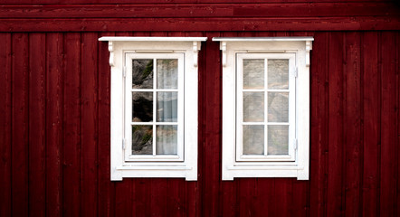 red hut with white windows, rural background or web background