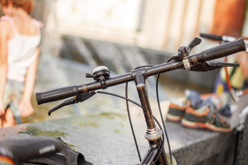 Bicycles near the city fountain.