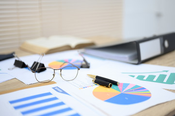 Business documents placed on the table at the office