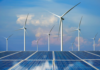 Solar energy panel photovoltaic cell and wind turbine farm power generator in nature landscape for production of renewable green energy is friendly industry. Clean sustainable development concept. © InfiniteFlow