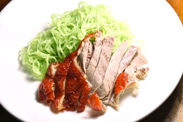  Chinese jade noodles topping slice roasted duck on plate