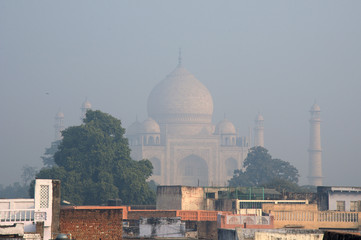 Taj Mahal surrounded by early morning fog