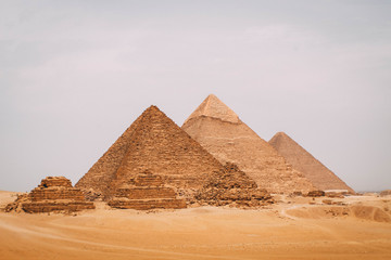 Fototapeta na wymiar Panoramic view of the six great pyramids of Egypt. Pyramid of Khafre, pyramid of Khufu, and the red pyramid.