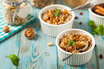 Traditional, mexican baked sweet rice, with almonds, raisins and walnuts.