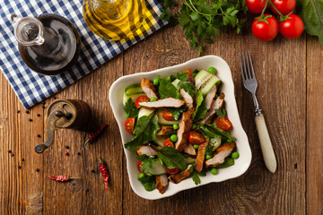 Delicious salad with grilled veal, beetroot and cucumber. Top view.