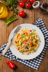 Nasi goreng. Fried rice with egg and vegetables.