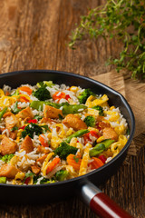 Nasi goreng. Fried rice with egg and vegetables.