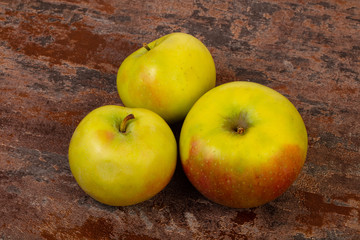 Ripe apples over background