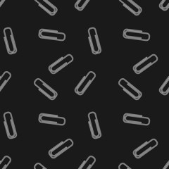 Seamless inverse black and white paperclip office pattern vector