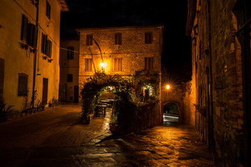 Vintage style image of old European city at night