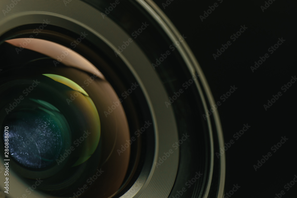 Poster close up beautiful camera lens of black background. macro view..