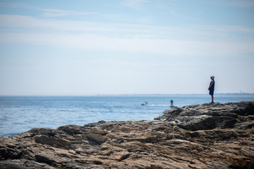 Fototapeta na wymiar woman on the ocean cliffs