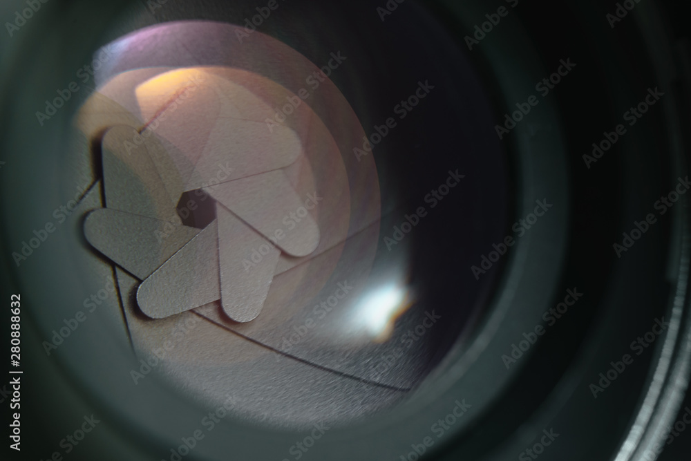 Poster close up beautiful camera lens on a dark background. macro view.
