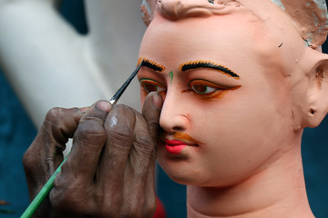 Clay idol of God Kartik, under preparation for Bengal's Durga Puja festival at Kumartuli Kolkata....