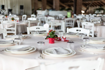 table set for wedding with floral centerpieces
