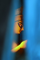 Idol of Hindu Goddess Durga during preparations in Kolkata. Clay idol of Goddess Durga, under...