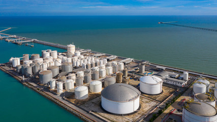 Aerial view of tank terminal with lots of oil storage tank and petrochemical storage tank in the...
