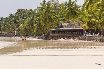 Beautiful beach with white sand and tree