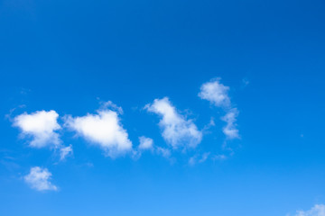 Nature Bright blue Sky with white clouds on blackground. Beautiful sky and clouds in the afternoon.