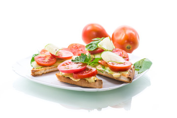 tasty sandwich with curd paste, fresh cucumbers and tomatoes