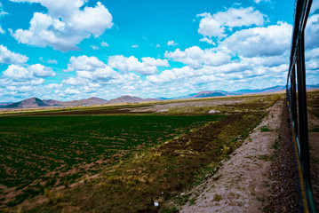 scenic landscape with view of mountains and greenery         