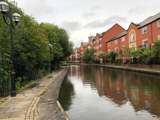 Fototapeta na wymiar Waterside river in Piccadilly Village in Manchester