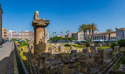 Fototapeta na wymiar The remains and ruins of the oldest greek temple in Sicily the Temple of Apollo in Ortygia (Ortigia) island in Syracuse, Sicily, south Italy