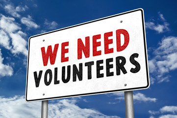 We need volunteers - road sign message