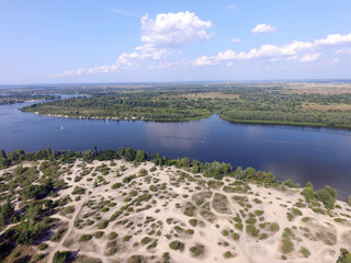 Aerial drone view of Kiev cityscape, Dnepr river.