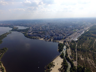 Aerial drone view of Kiev cityscape, Dnepr river.